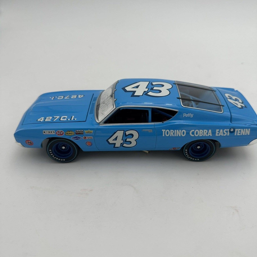 Team Caliber Richard Petty #43 Ford Torino Cobra Autographed 1:24
